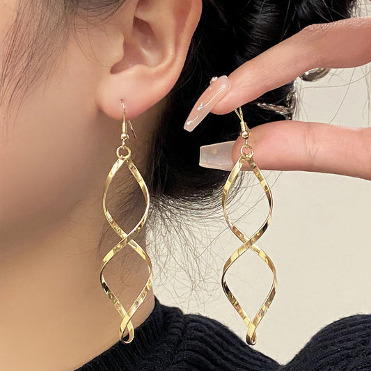 Spiral Dangle Oorbellen | Goud