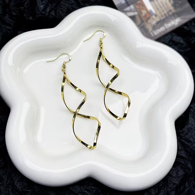Spiral Dangle Oorbellen | Goud
