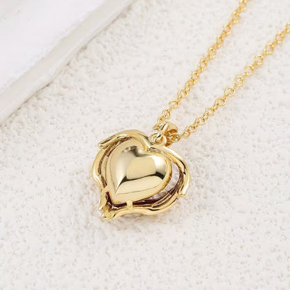 Engel Embrace Robijnen Hart Ketting | Goud