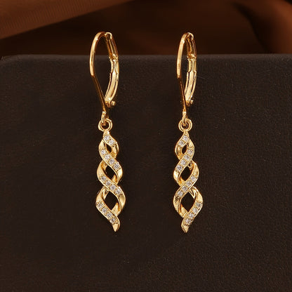 Shimmer Twist Ava Oorbellen | Goud