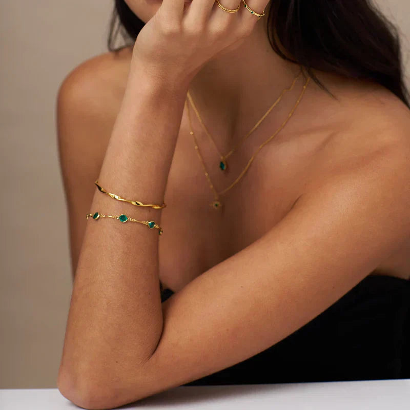 Smaragden Schakel Schakelarmband | Goud